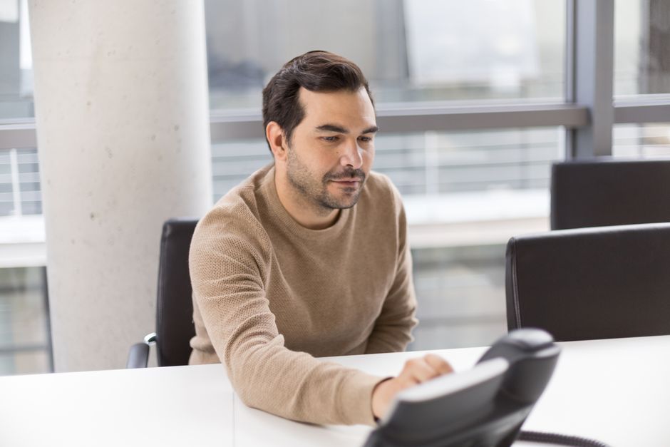 AI receptionist pilot testing for a business phone system